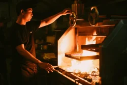 Sizzling charcoal-grilled yakitori, a modern Japanese twist in Canggu chef grilling yakitori skewers over charcoal at Billy Ho Canggu