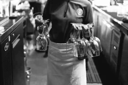 Our team prepping glassware for your modern Japanese dining experience waitstaff carrying glassware at Billy Ho modern Japanese restaurant in Canggu