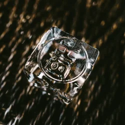 Hand-carved ice cube engraved with our logo, perfect for chilling cocktails hand-carved square ice cube engraved with the Billy Ho logo for cocktails