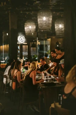 Lively group dining in our modern Japanese restaurant in Canggu group of guests enjoying modern Japanese dining at Billy Ho in Canggu